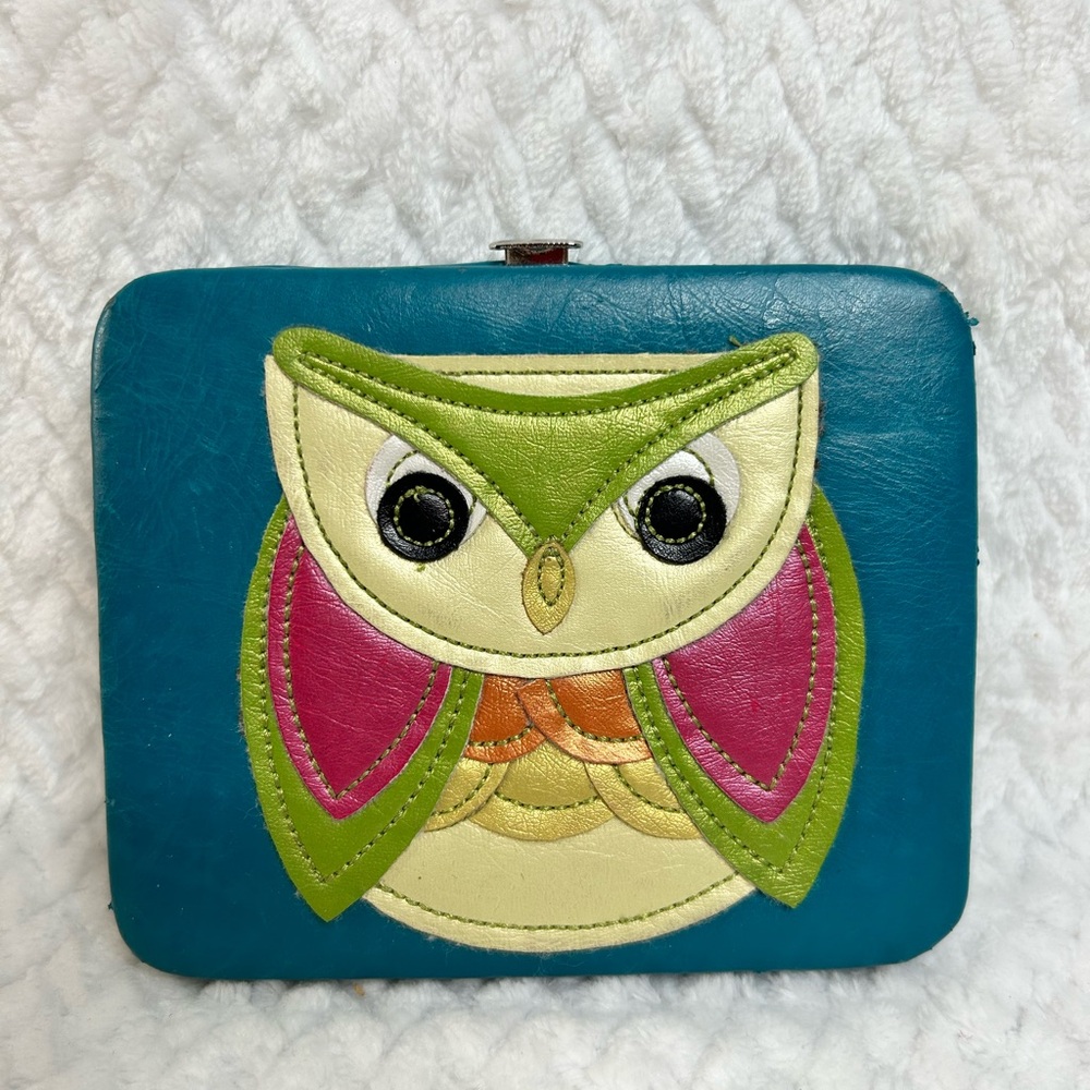 Owl seen on pieces hard sided clasp closure
